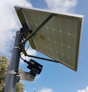 Solar powered bicycle counter mounted on a pole