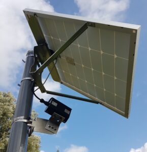 solar powered bicycle counter mounted on a pole