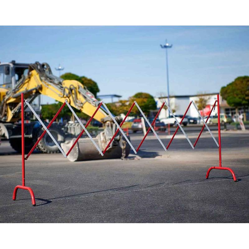 Red & white extending safety barrier – steel - site image